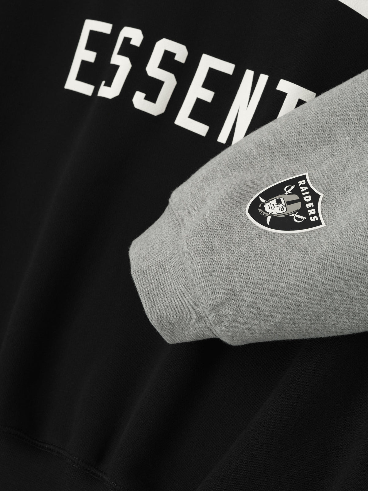 Buzo Fear of God Essentials Raiders Sport Black/Concrete Heather