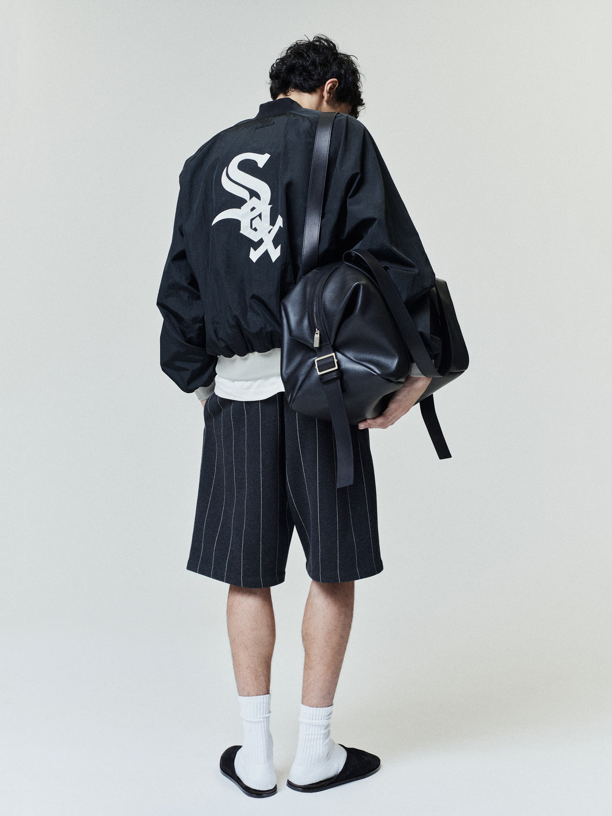 Campera Fear of God Essentials Blanco Sox Half Zip Negro