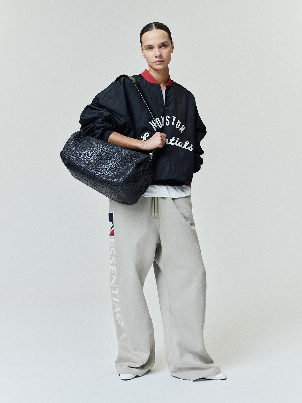 Buzo Fear of God Essentials Astros Half Zip Negro