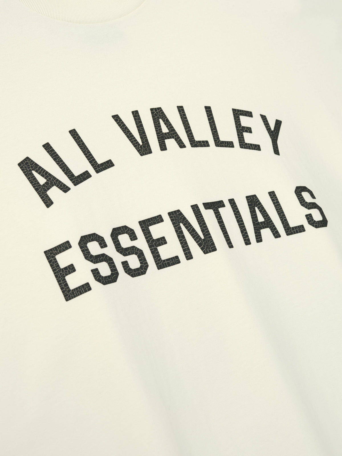 Remera Fear of God Essentials Merch Boxy Fit Ivory