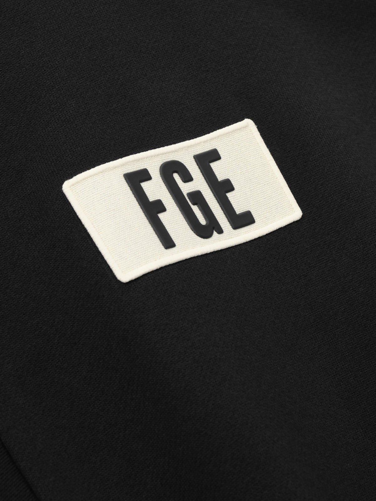 Buzo Fear of God Essentials 90s Vintage Black