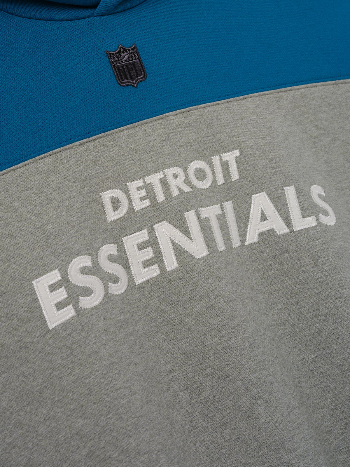 Buzo Fear of God Essentials Lions 90s Relaxed Concrete Heather