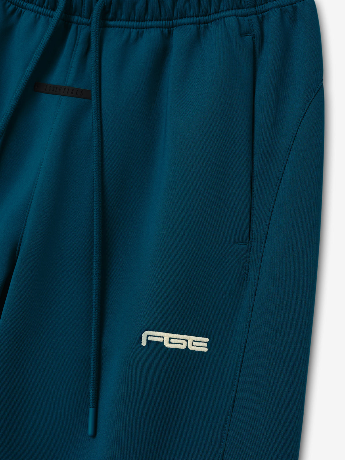 Remera Fear of God Essentials Slim Trackpant Night Sea